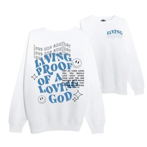 White sweatshirt with blue inspirational text design on front.
