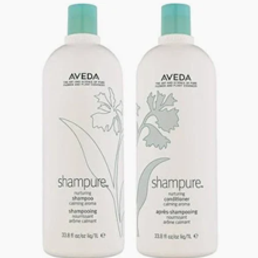 Two Aveda Shampure shampoo bottles with floral designs.
