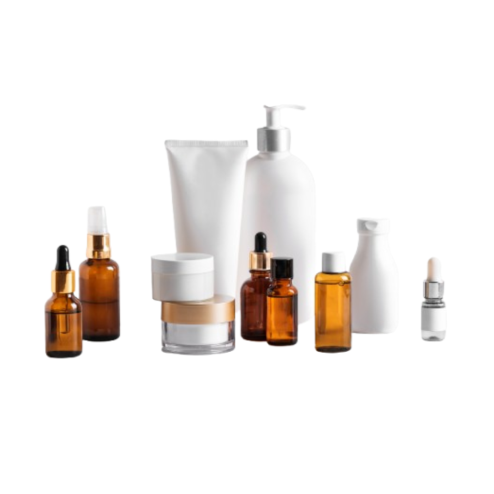 Collection of amber glass and white skincare containers on white.